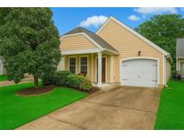 Charming home showcasing its manicured lawn, a paved driveway, and an attached one car garage at 4922 Carson Glen Ln, Acworth, GA 30101