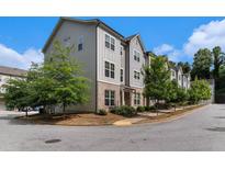 View of the townhome's exterior highlighting the architecture, landscaping, and neighborhood charm at 1624 Venture Point Way, Decatur, GA 30032