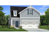 Charming two-story home with gray siding, a two-car garage, and a well-manicured front yard at 80 Hydrangea Cir, Fairburn, GA 30213