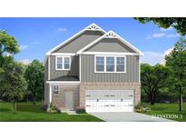 Charming two-story home features brick accents, gray siding, white trim, and a two-car garage at 7 Camellia Dr, Fairburn, GA 30213