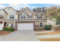 Charming two-story home with a two-car garage, brick accents, and a well-manicured lawn at 331 Franklin Ln, Acworth, GA 30102