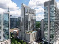 Stunning aerial view of high-rise condos boasting luxurious amenities and a modern design at 855 Peachtree Ne St # 2203, Atlanta, GA 30308