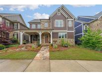 Charming home with stone accents and a beautifully landscaped front yard at 423 Hunt Ne St, Marietta, GA 30060
