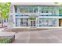 Modern building, Midcity Lofts, has large windows and a stone facade, located at 845 at 845 Spring Nw St # 127, Atlanta, GA 30308