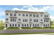 Charming townhome exterior with gray brick, shutters, and well-manicured lawn at 208 Maycrest Path, Tucker, GA 30084