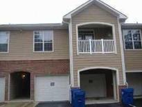 Charming townhouse with a covered parking space and a small balcony, a delightful place to call home at 3500 Sweetwater Rd # 522, Duluth, GA 30096