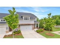 Charming two-story home with a manicured lawn and a welcoming entrance, perfect for suburban living at 4591 Grenadine Cir, Acworth, GA 30101