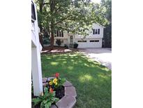 Charming two-story home with a well-manicured lawn and an inviting front entrance at 115 Jamie Dr, Hiram, GA 30141