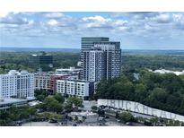Stunning Buckhead condo features panoramic city views and lush greenery from a high-rise vantage point at 3445 Stratford Rd # 1501, Atlanta, GA 30326