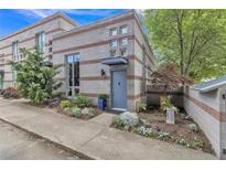 Striking modern home with unique brick-lined concrete block exterior and professional landscaping at 542 Ralph Mcgill Ne Blvd # 7, Atlanta, GA 30312