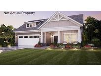 Charming single-Gathering home with a well-manicured lawn, complemented by a spacious garage and inviting front porch at 3462 Fishpond Cir, Dacula, GA 30019