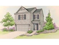 Charming two-story home featuring a craftsman-style exterior and a well-manicured front yard at 2623 Jordan Ln, Lithia Springs, GA 30122