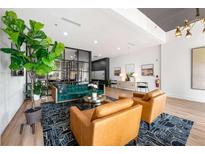 A stylishly decorated lobby with modern furnishings and a vibrant color palette at 260 N. 18Th St # 10326, Atlanta, GA 30363