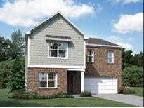 Two-story home showcases brick and shingle exterior, front yard, and attached garage at 7791 Sudbury Cir, Covington, GA 30014