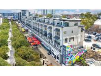Stunning exterior view of luxury condos, showcasing modern architecture and vibrant urban landscaping at 661 Auburn Ne Ave # 10, Atlanta, GA 30312