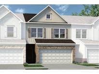 Charming townhome features a brick facade and a two-car garage at 14 Jacobs Farm Ln # 7, Lawrenceville, GA 30045