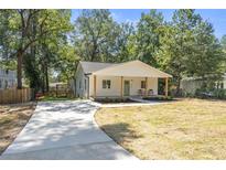 Charming, newly renovated single-story home with a welcoming front porch and manicured lawn at 1363 Diamond Se Ave, Atlanta, GA 30316