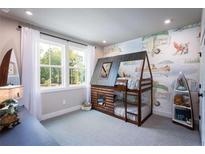 Fun bedroom featuring a log cabin style bunk bed and decorative camping themed wall art at 129 Henley St, Canton, GA 30114