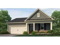 Charming single-Gathering home featuring a two-car garage, a welcoming front porch, and manicured landscaping at 3933 Fairhaven Rd, Lithia Springs, GA 30122