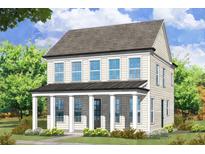 Charming two-story home with a welcoming front porch and classic architectural details at 41 Hydrangea Unit 73 Ln, Auburn, GA 30011