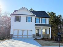 Charming new construction home with a two-car garage and a cozy front porch at 123 Deer Xing, Temple, GA 30179