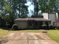 Charming single-story home with a landscaped front yard and a concrete driveway at 286 Toweridge Sw Dr # 3, Marietta, GA 30064