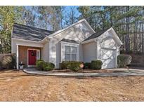 Charming single-Gathering home featuring vinyl siding, manicured bushes, and a red front door with an attached garage at 3700 Mays Xing, Atlanta, GA 30331