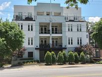 Beautiful condominium building featuring a modern architectural style and private balconies at 3655 Peachtree Rd # 203, Atlanta, GA 30319