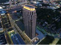 An eye-level view of an upscale condominium highlighting nearby cityscapes and roads at 270 17Th Nw St # 3606, Atlanta, GA 30363