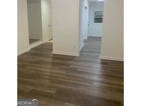 View of the hallway with wood flooring at 103 Tiburon Ct, Stonecrest, GA 30038