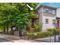 Charming multi-story building with wooden balconies and lush landscaping at 36 Daniel Se St # 5, Atlanta, GA 30312