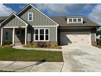 Charming one-story home featuring a two-car garage, landscaped front yard, and neutral exterior paint at 208 Saratoga Dr, Acworth, GA 30102