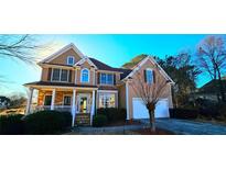 Beautiful two-story home with stone accents, a two-car garage, and manicured landscaping at 190 Country Club Dr, Hiram, GA 30141