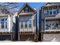 Charming home featuring a stone facade, bay window, and a one car garage at 3005 Devoncroft Se St, Smyrna, GA 30080