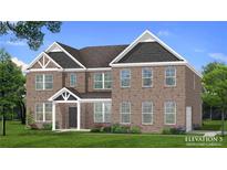 Beautiful two-story brick home with a charming entryway and well-manicured lawn at 162 Haverling Pass, Hampton, GA 30252