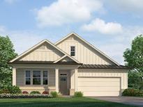 Charming single-Gathering home featuring a symmetrical facade, neutral tones, and a two-car attached garage at 48 Lakeview Pt, Dallas, GA 30157