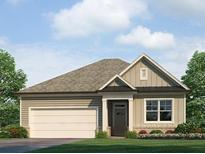 Charming single-story home with neutral siding, a covered entrance, and an attached garage at 64 Lakeview Pt, Dallas, GA 30157