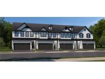 Modern townhome exterior boasts white siding, black trim, and attached garages for convenient parking at , Fayetteville, GA 30214