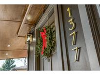 Inviting front door adorned with a festive wreath and clear house numbers for a welcoming touch at 1377 Dorothy Dr, Decatur, GA 30030