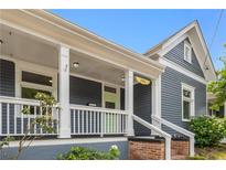Charming home featuring a welcoming covered front porch and stylish exterior at 481 Glenwood Se Ave, Atlanta, GA 30312