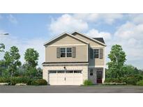 Charming two-story home with brick and siding, features a two-car garage and manicured landscaping at 6123 Knickerbocker St, Mableton, GA 30127