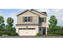 Charming two-story home with brick and siding, showcasing a two-car garage and well-manicured landscaping at 6123 Knickerbocker St, Mableton, GA 30127