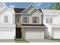 Charming townhome showcasing a two-car garage and attractive mixed-material facade at 102 Jacobs Farm Ln # 40, Lawrenceville, GA 30045