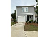 Charming two-story home with a one-car garage, complemented by a well-maintained lawn at 3558 Eagle Court, Fulton, GA 30331