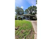 Charming home with a covered front porch and carport at 214 Upshaw Sw St, Atlanta, GA 30315