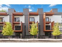 Modern townhome exterior with sleek design, balconies, and professional landscaping at 367 Parkway Ne Dr # 3, Atlanta, GA 30312