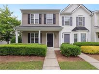 Charming townhome with well-maintained landscaping and a welcoming front porch at 1823 Devon Dr # 1823, Atlanta, GA 30311