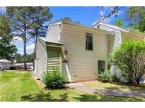 Charming two-story home with lush landscaping and a well-maintained lawn in a serene neighborhood at 4406 Idlewood Ln, Tucker, GA 30084