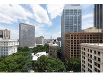 An urban view of the surrounding high-rise buildings shows the bustling city environment with a partly cloudy sky at 57 Forsyth Nw St # 11G, Atlanta, GA 30303