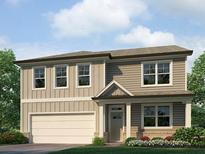 Charming two-story home with beige siding, neutral trim, an attached garage, and a well manicured front yard at 48 Hampton Ter, Dallas, GA 30157
